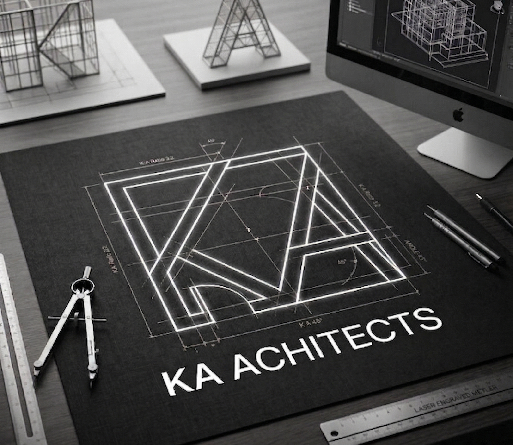 KA Architects branding on dark surface